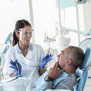 Dentist explaining treatment to patient